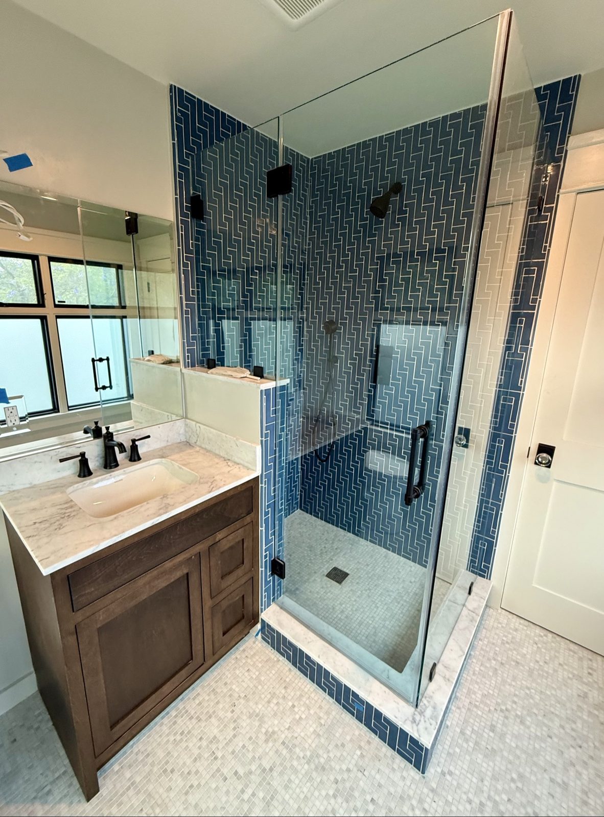 Bathroom remodel, blue patterned tile shower